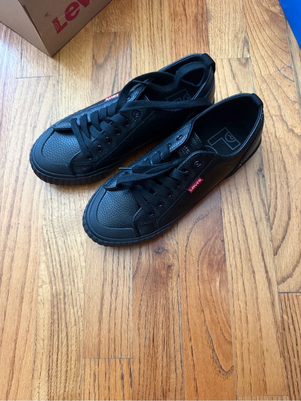 Levi's Black Low-Top Lace-Up Sneakers with Red Logo Tab